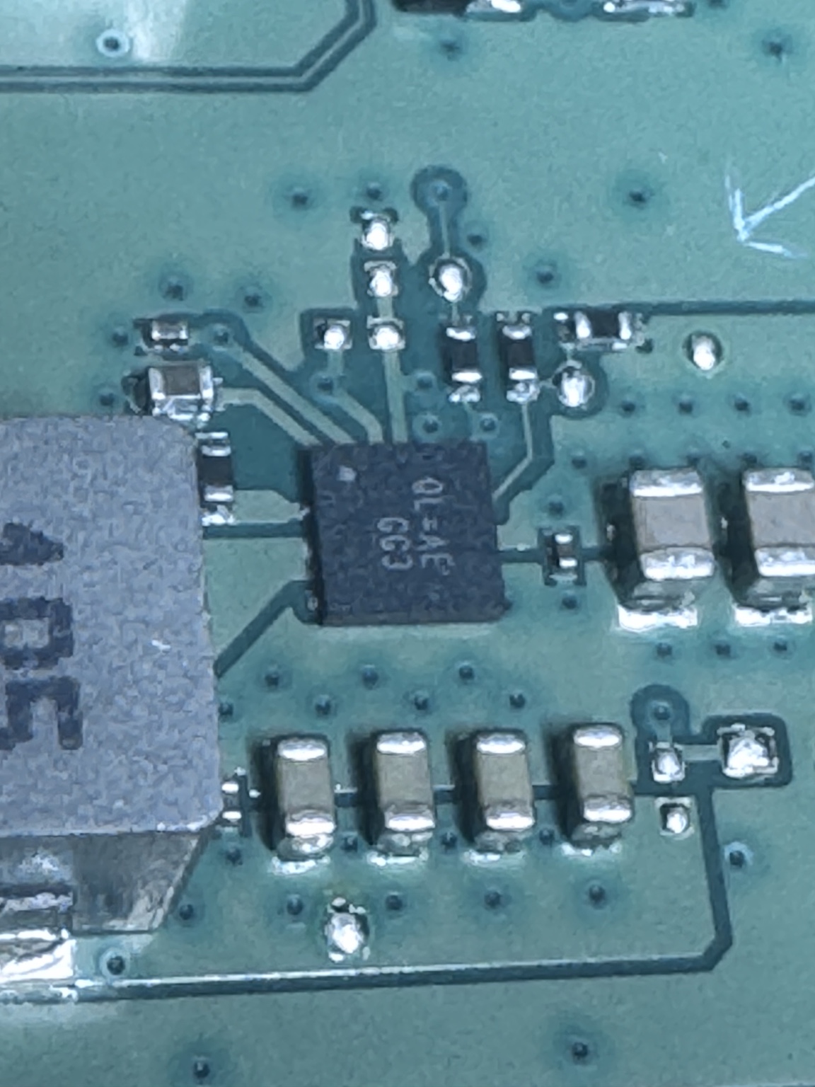 Close microscope view of an electronic component on a motherboard