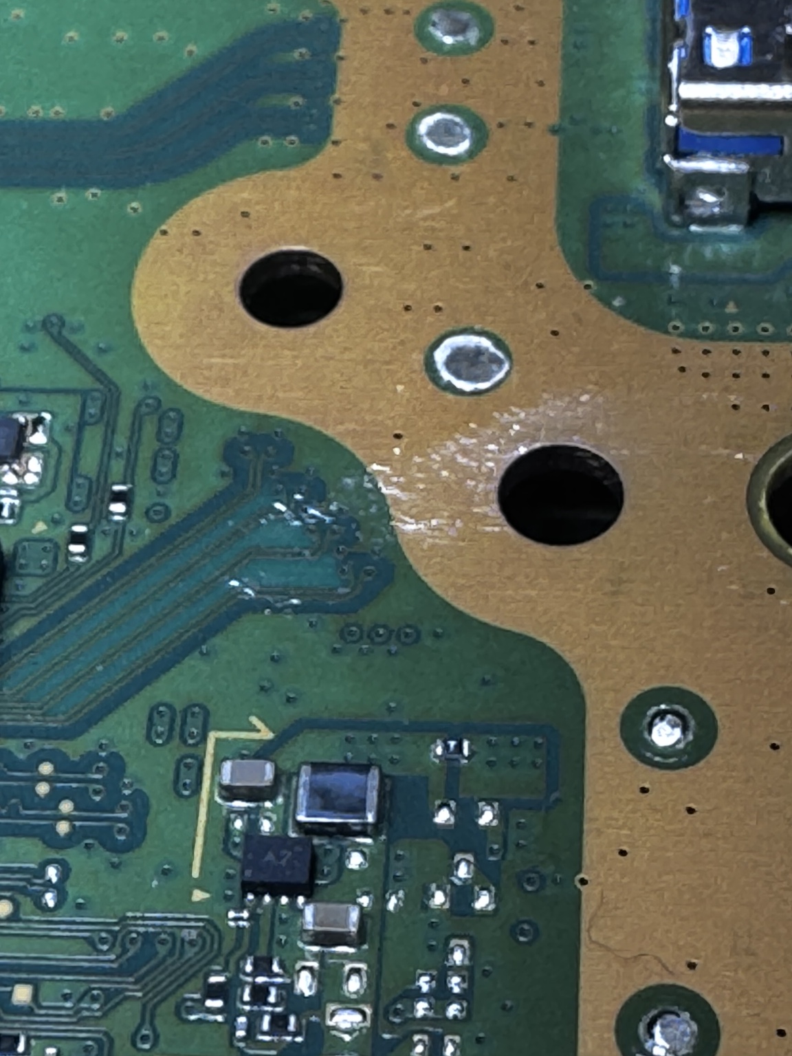 Game console motherboard during board-level repair